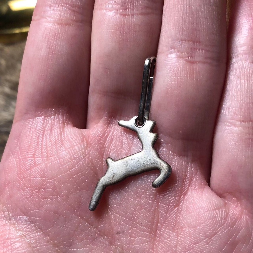 Vintage silver toned leaping deer pendant